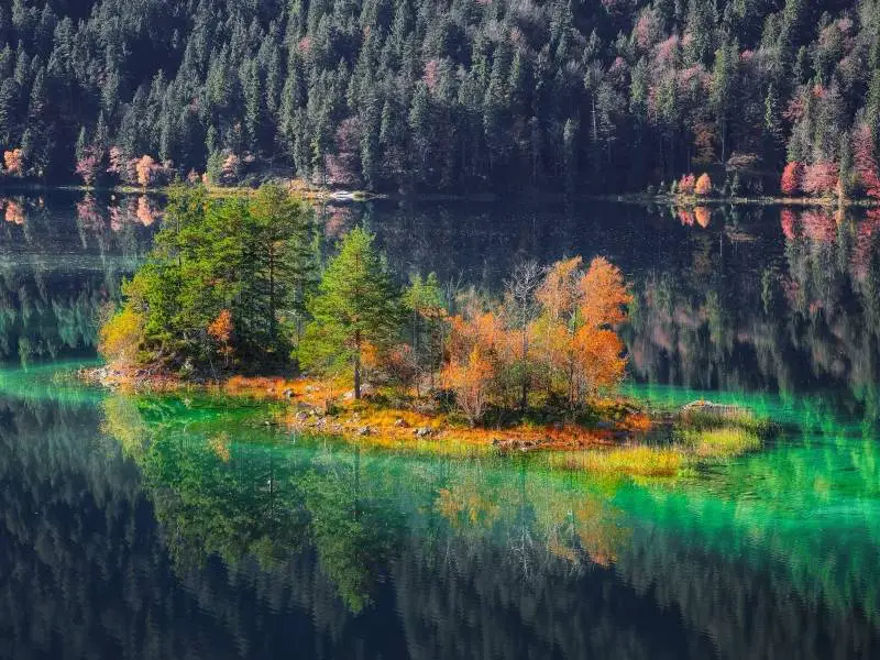 Emerald green water of Eibsee during late summer