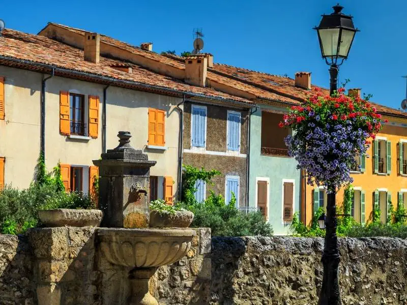 Moustiers Sainte Marie France - Fountains and street lamp in the village 