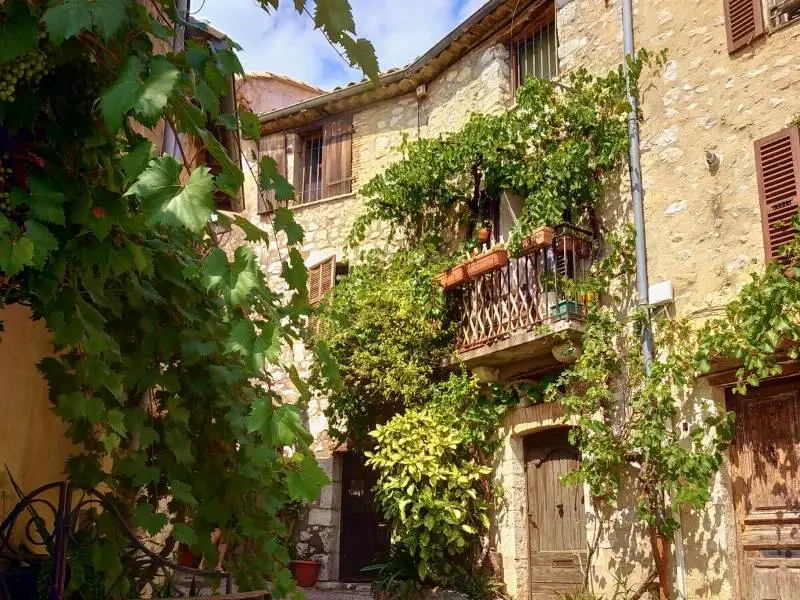 Saint-Paul-de-Vence France, The old world charm of a medieval village, plants covering the facade of a house